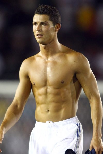 Cristiano Ronaldo removes his Real Madrid soccer jersey in Pasadena, CA.