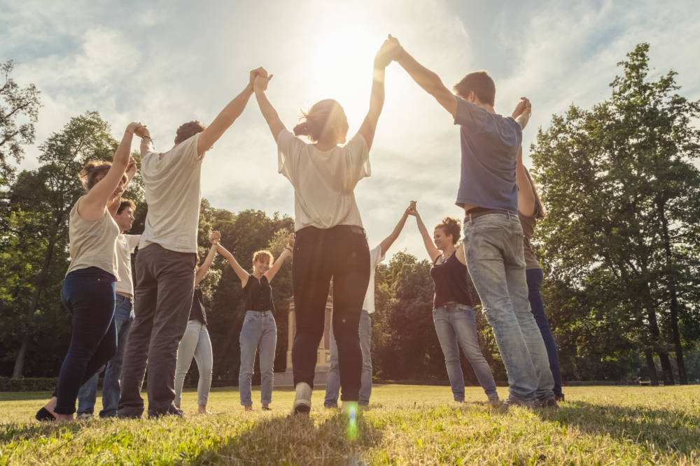 Jewelers Mutual Insurance Company - Band Together - Arms Lifted Group