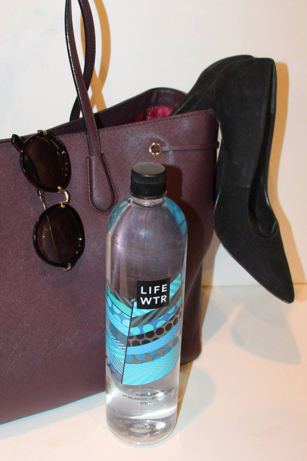 Sparkles and Shoes What is in My Bag with LIFEWTR