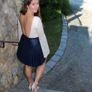 J. Crew Pleat Faux Leather Miniskirt in Navy and the back of the Billabong Eternal Bliss Crochet Lace Bodysuit