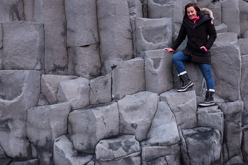 Climbing the Basalt Stacks at Reynisfjara Black Sand Beach in Vik Iceland