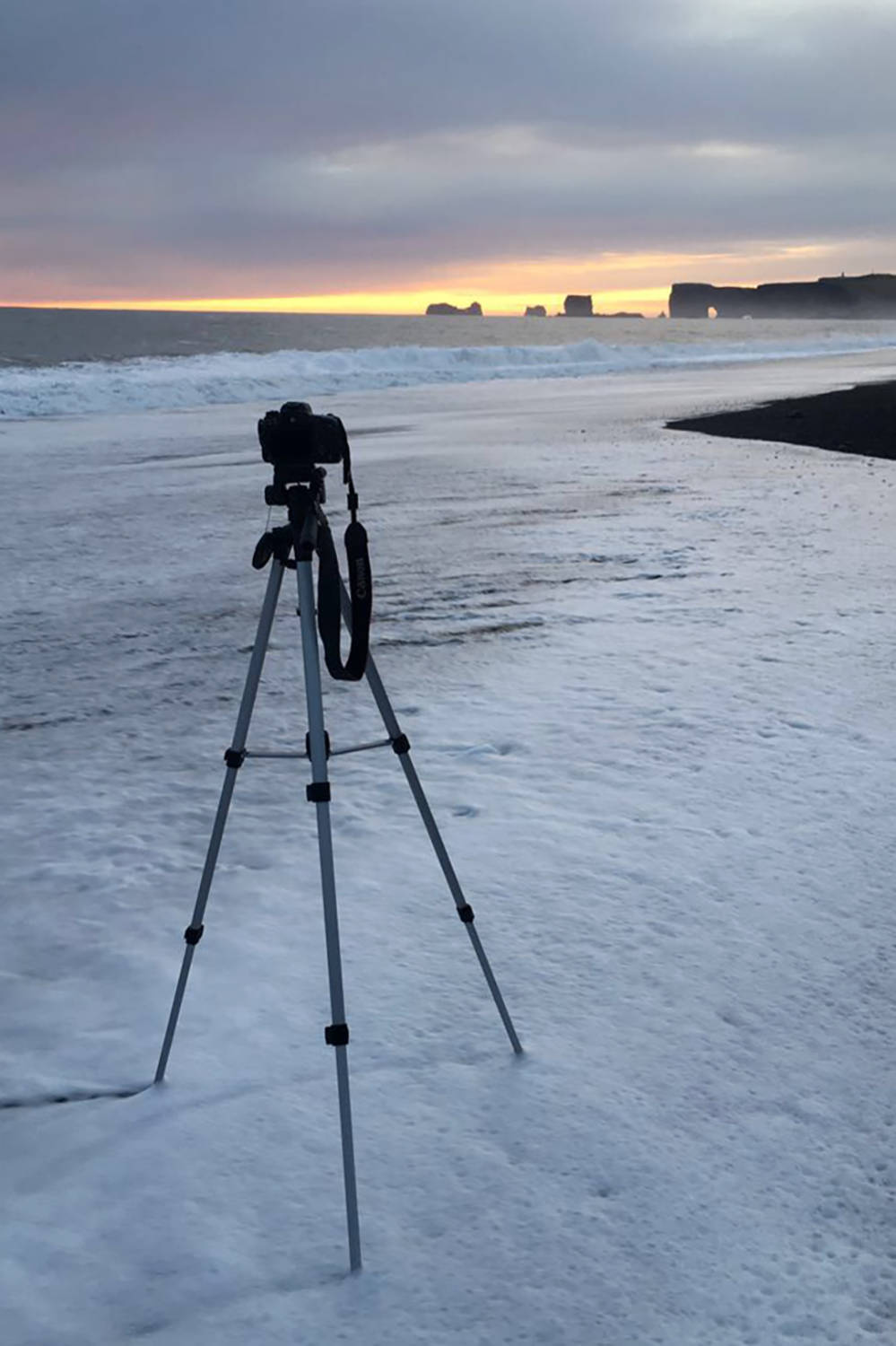 DSLR and Tripod at Reynisfjara Black Sand Beach in Vik Iceland