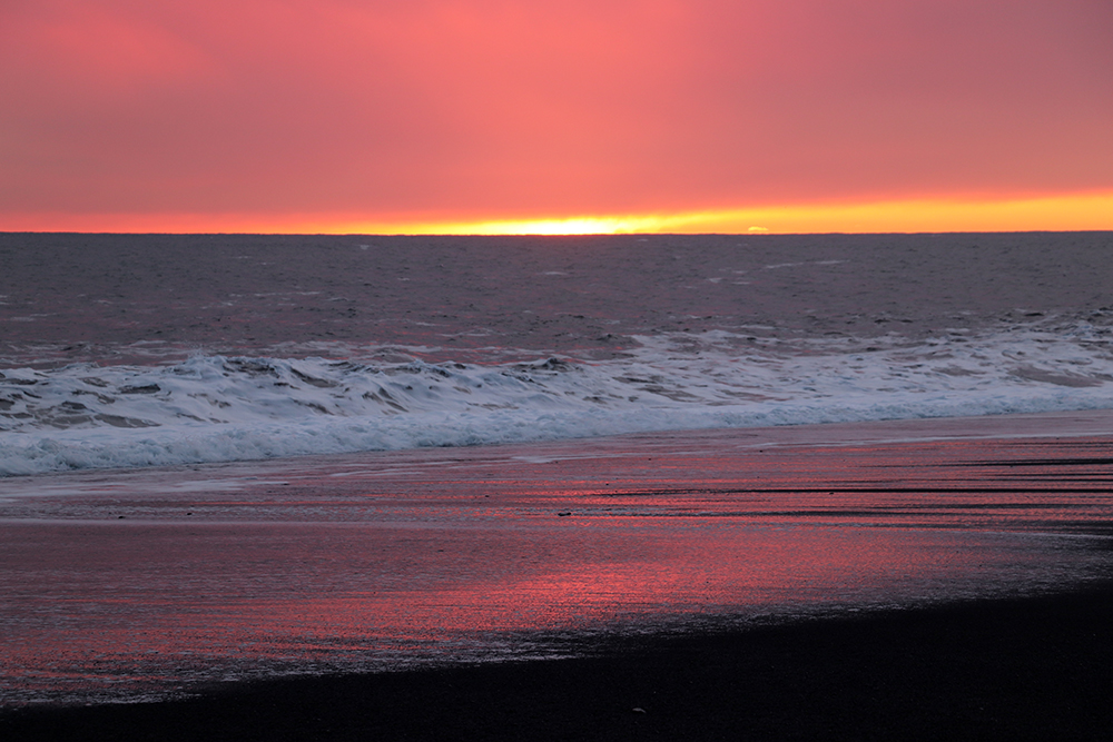 Pink Sunset at Reynisfjara Black Sand Beach in Vik Iceland