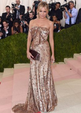 Style Icon Sienna Miller at the 2016 Met Gala in a Gold Dress