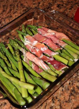 Glass Pan of Prosciutto Wrapped Asparagus