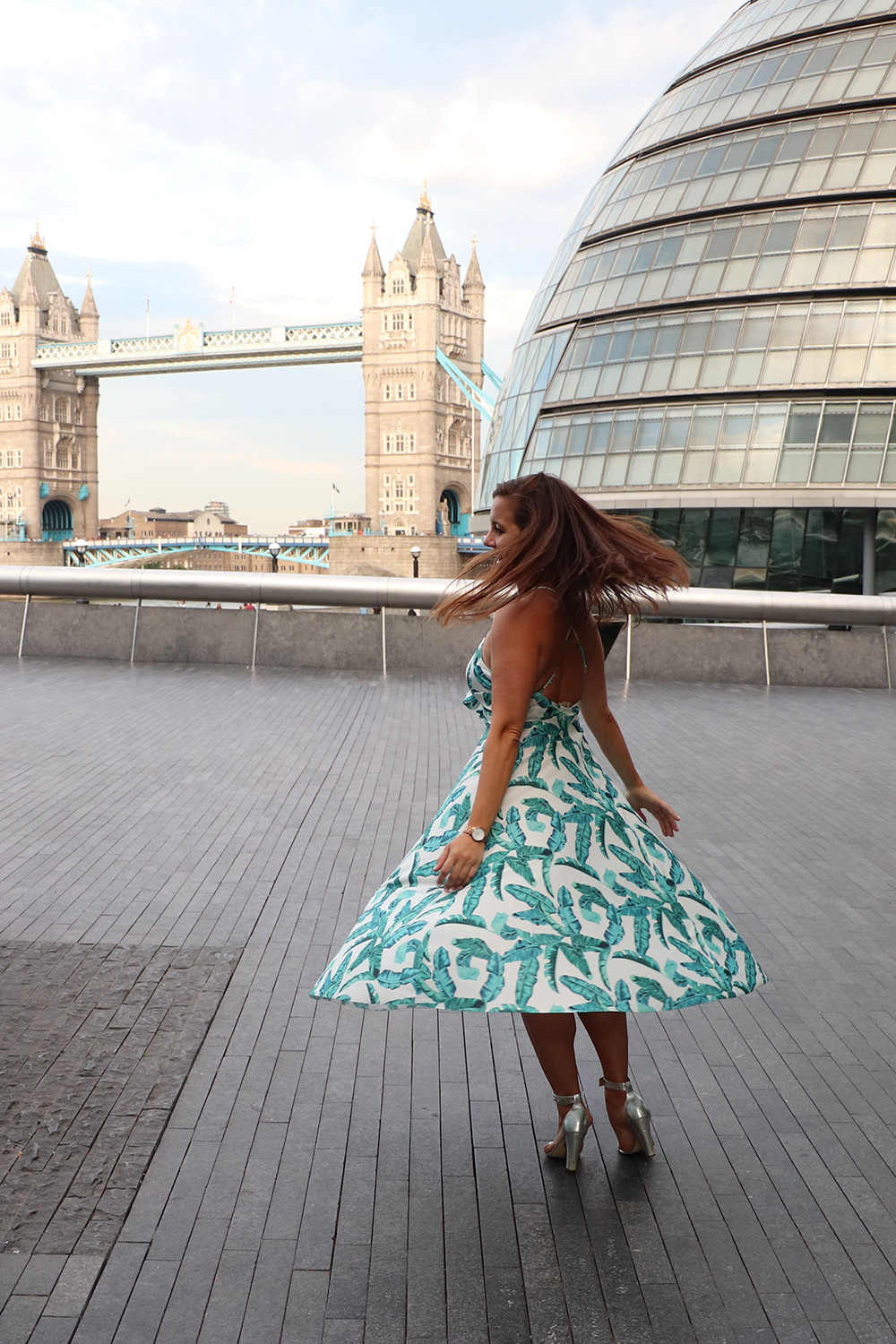 Twirling in ASOS knot front pleated midi dress