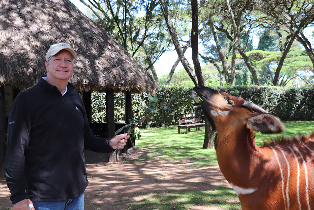 Feeding an Elk at Mount Kenya Safari Club Orphanage