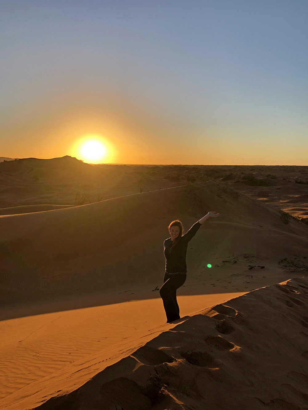 Camping in the Sahara - Kelly at Sunrise Over the Dunes