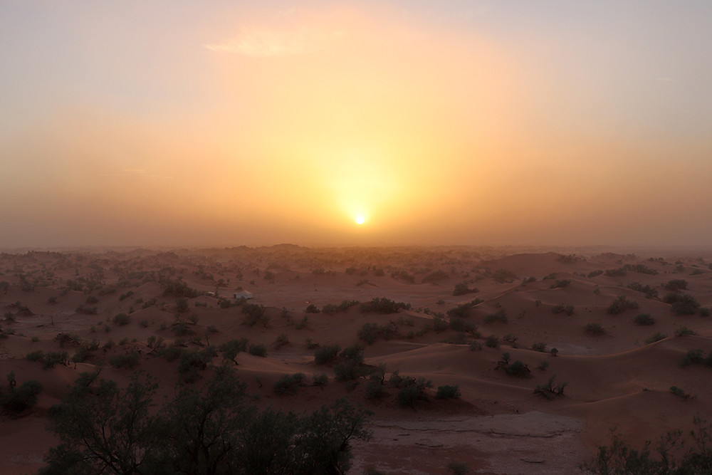 Camping in the Sahara - Sunset in Dust Storm Over the Dunes