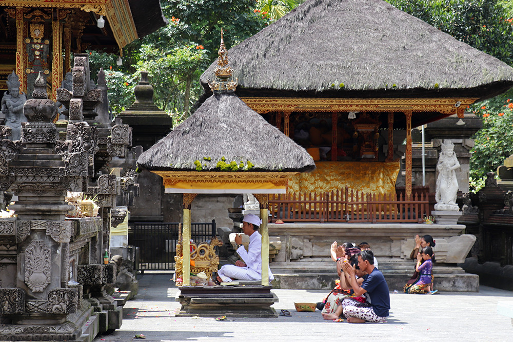 Praying at the Bali Tirta Empul Temple