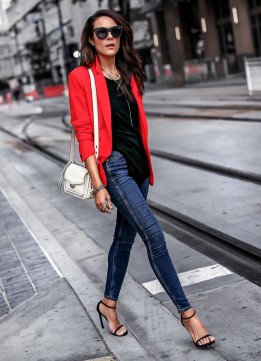 Lucy Hernandez of Lucy's Whims in a Red Blazer