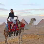Travel Blogger Kelly Donlin at the Great Pyramids in Giza Egypt