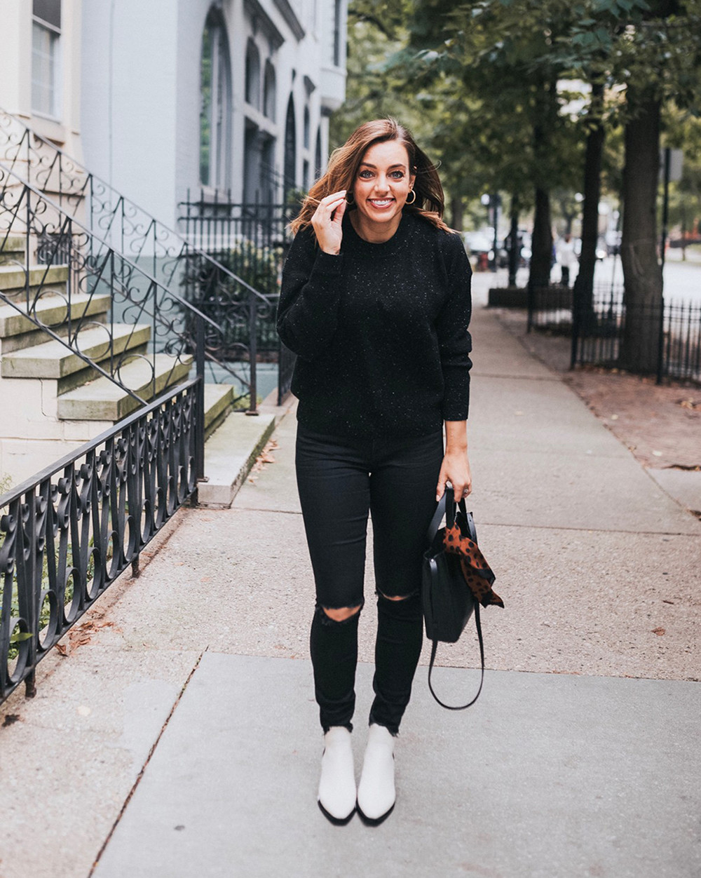 Jaclyn Crabbe of Sharing My Sole in White Ankle Boots