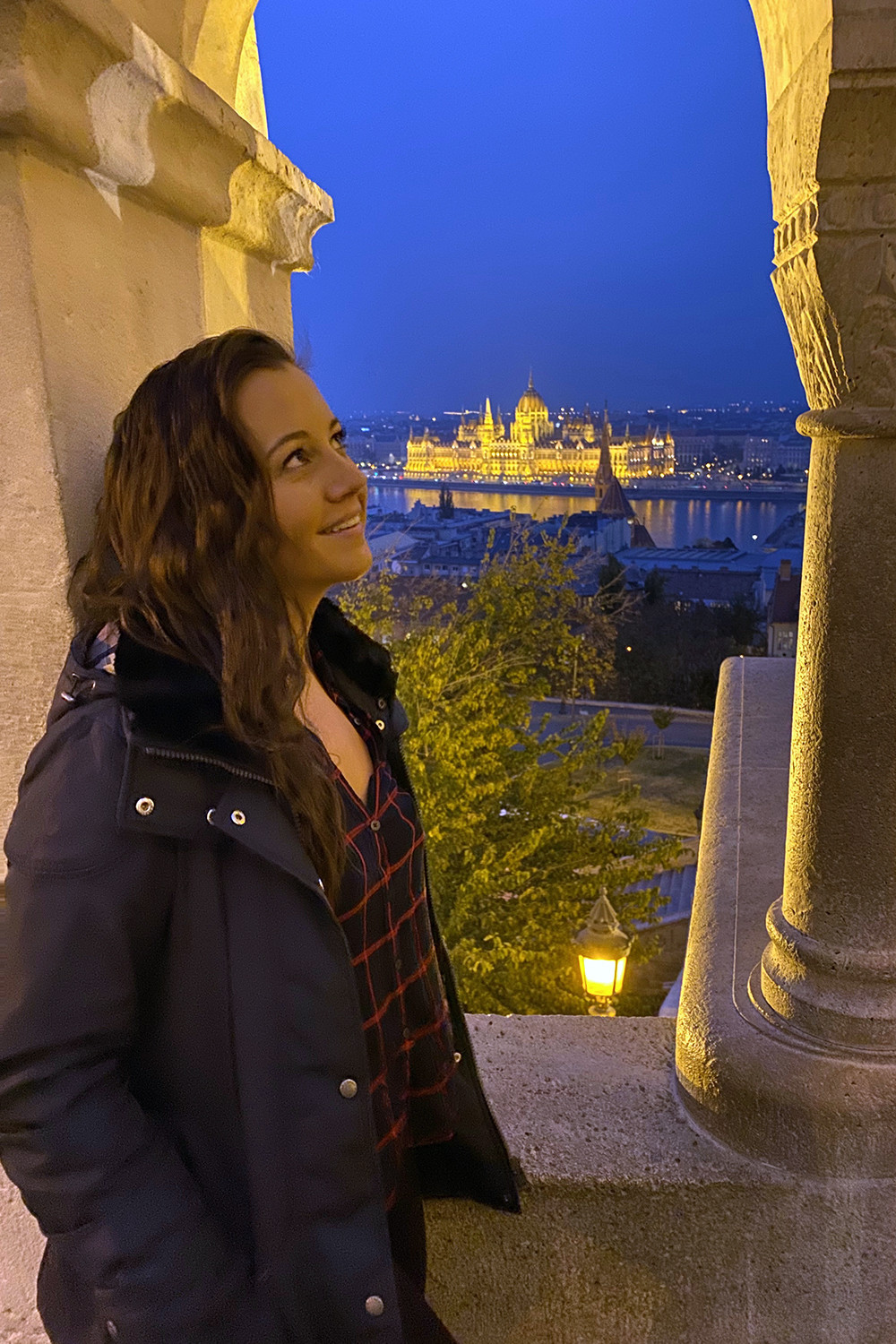 Travel Blogger by the Hungarian Parliament from Fishermans Bastion in Budapest