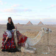 Travel Blogger on a Camel at the Pyramids