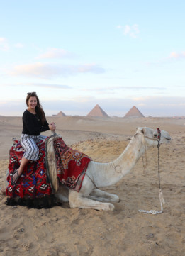 Travel Blogger on a Camel at the Pyramids
