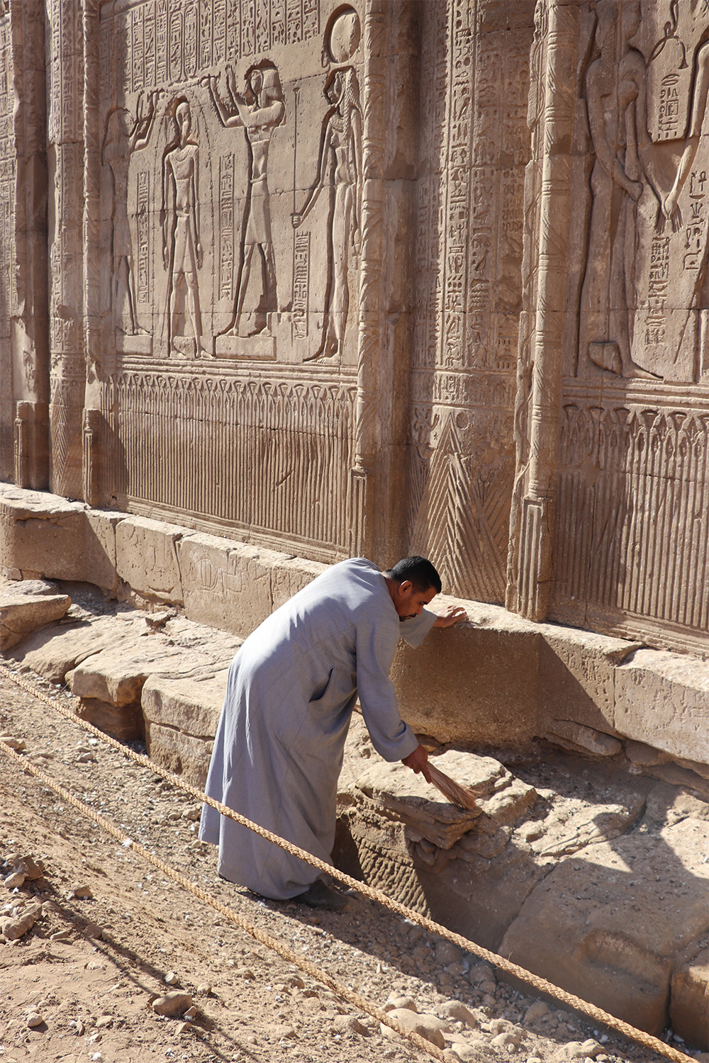 Cleaning the Carvings Outside the Temple of Khnum in Esna