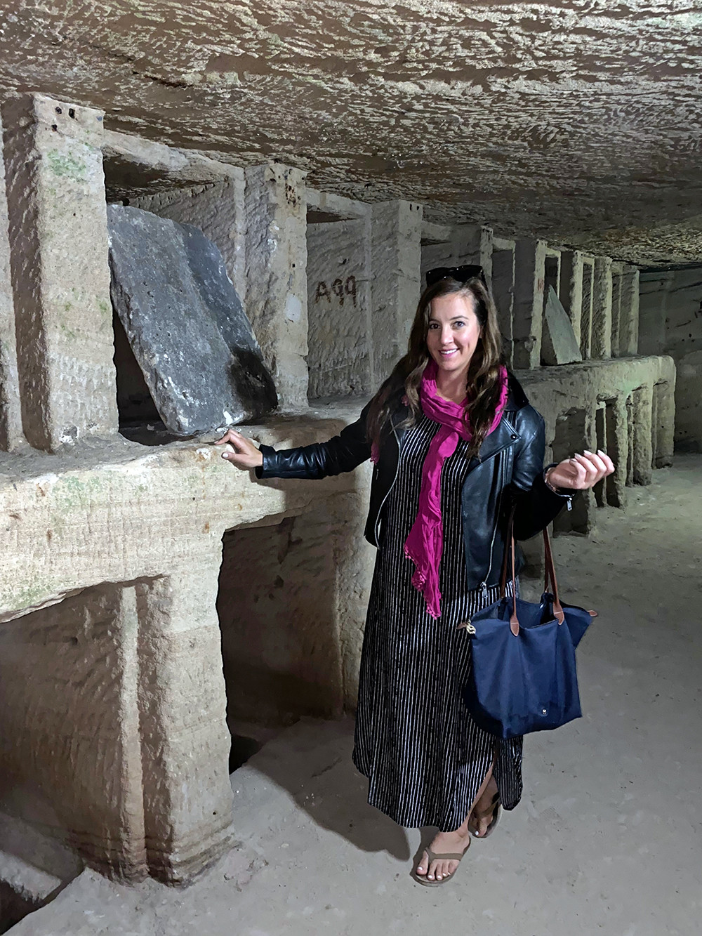 Travel Blogger with Clusters of Tombs in the Catacombs of Kom el-Shuqafa
