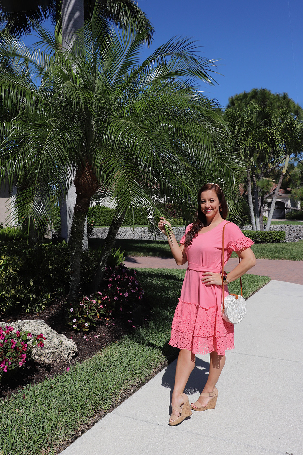 Coral Dress with Cork Wedges and White Woven Straw Rattan Bag
