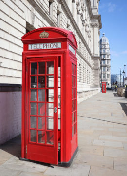 Red Phone Booth and Empty Parliament Square Garden in Westminster