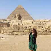 Travel Blogger Kelly Donlin with the Great Sphinx of Giza and the Egyptians Pyramids