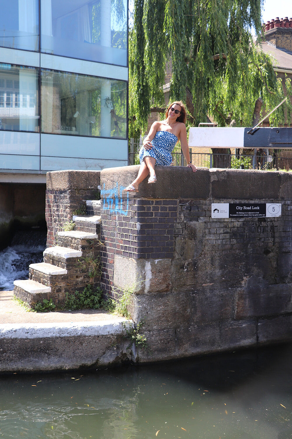 Fashion Blogger in Ikat Print Dress at London Canal