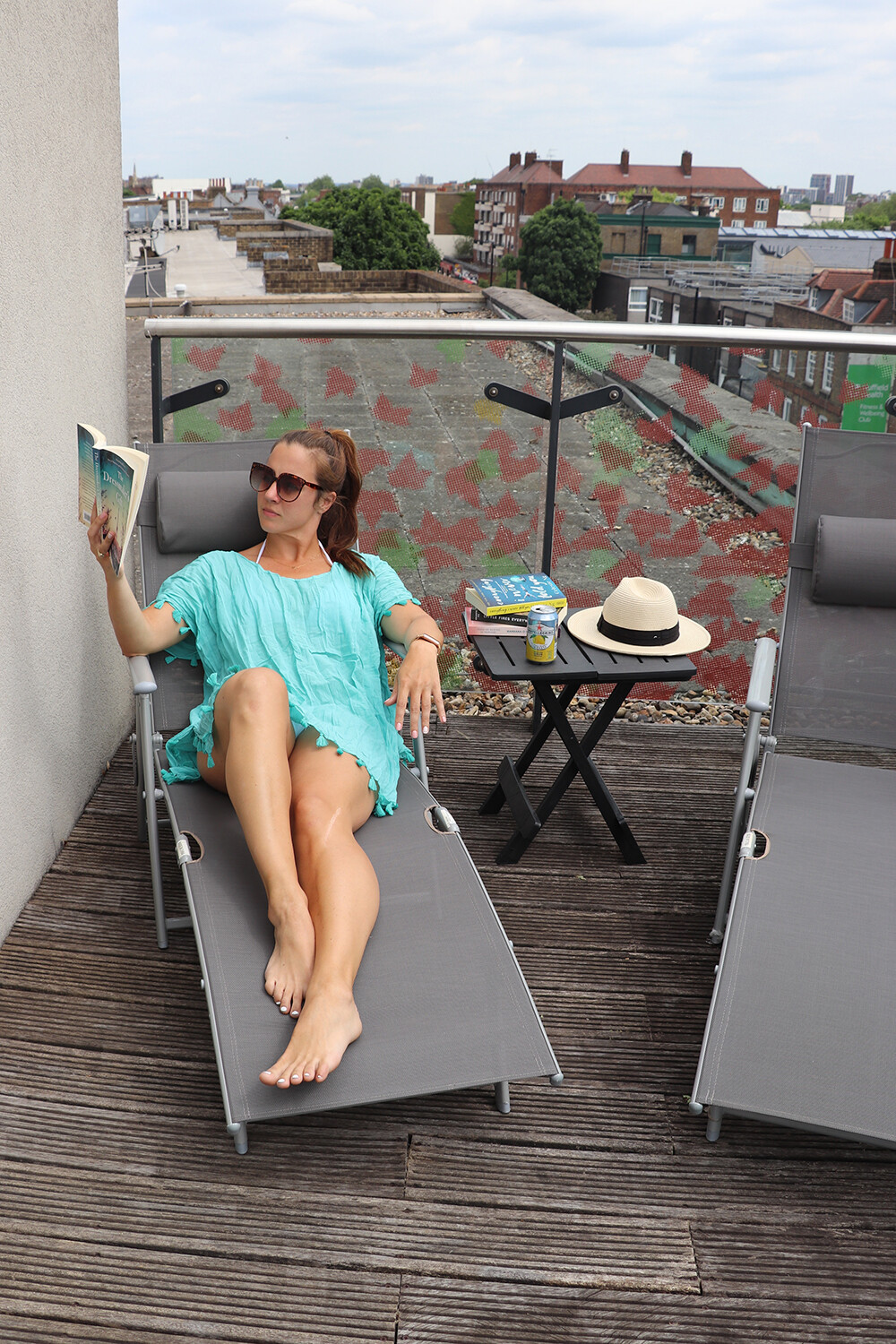 London Blogger Reading on Balcony