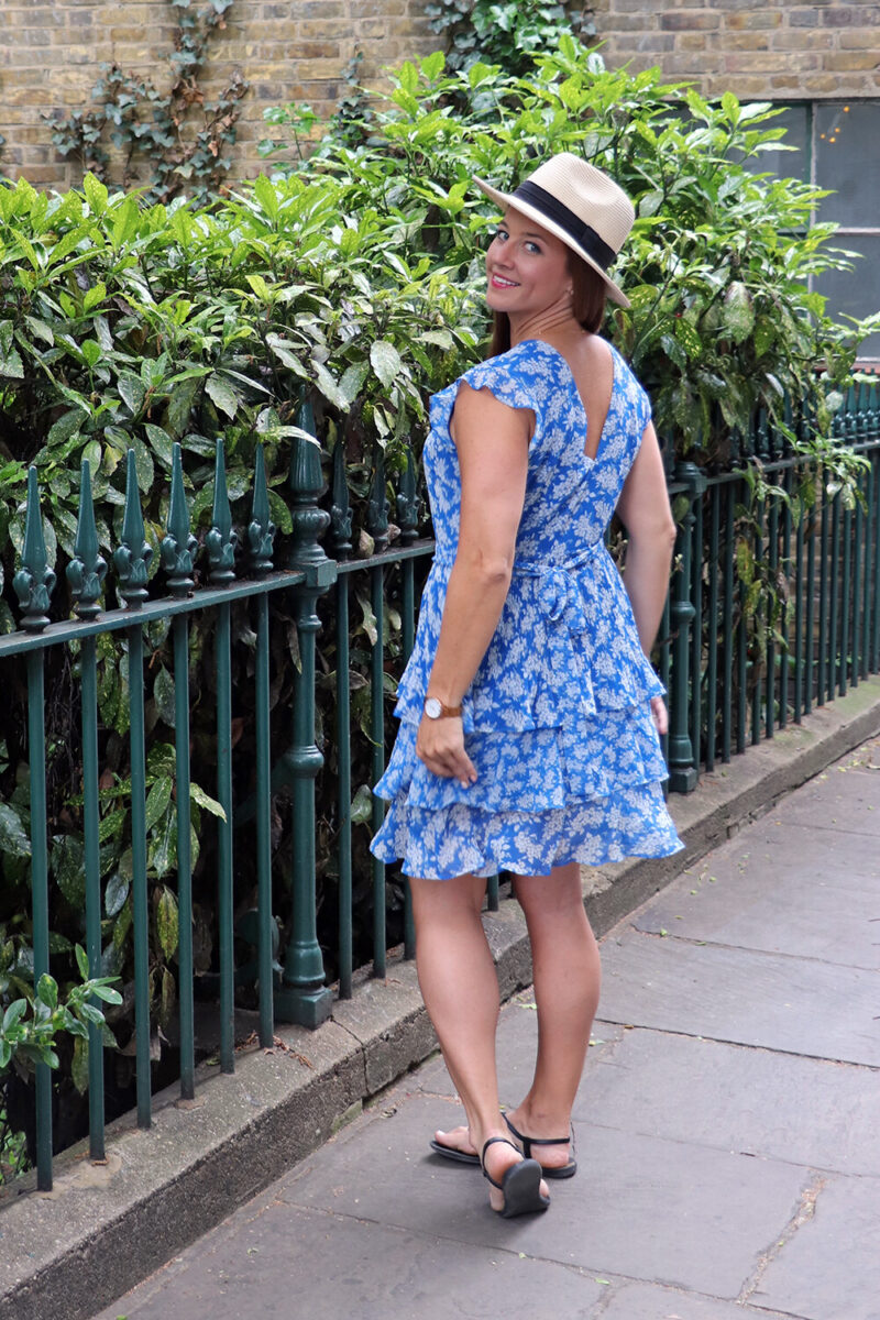 London Fashion Blogger in Floral Mini Dress and Straw Hat