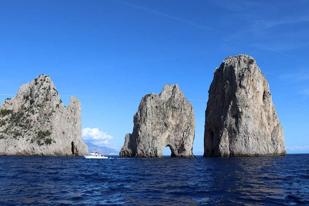 Faraglioni di Mezzo Islands off the Coast of Capri Italy