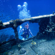 Travel Blogger through the Porthole of the Lesleen M Wreck