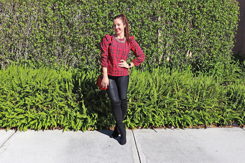 J Crew Tartan Ruffle Top with black boots and leggings