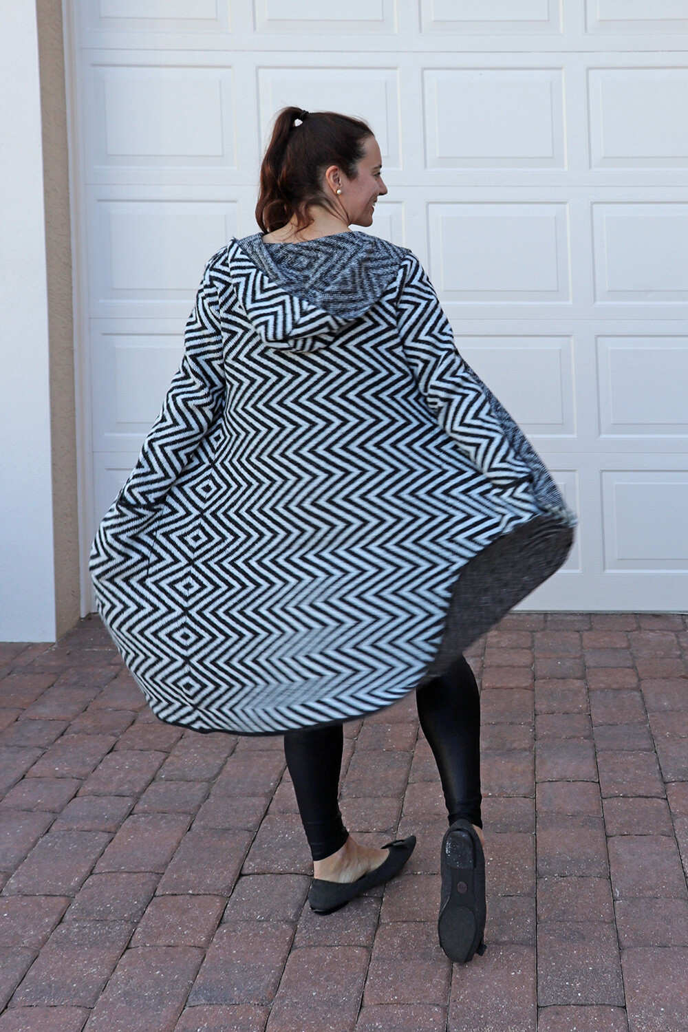 Twirling in a Cardigan Sweater Coat