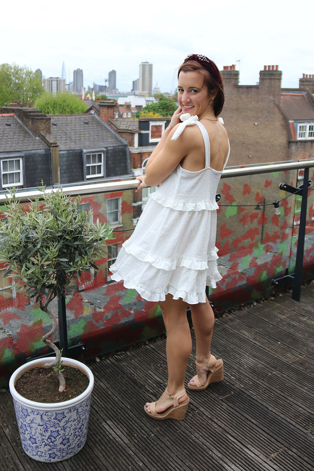 London Blogger in Asos White Ruffle Dres and Stuart Weitzman Wedges