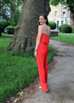 UK Fashion Blogger in a Strapless Red Jumpsuit