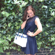 Navy Lace Dress and White Bag