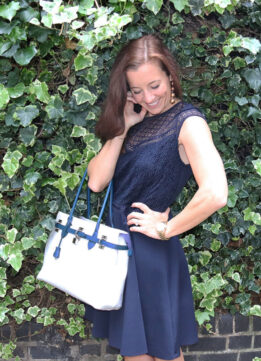 Navy Lace Dress and White Bag