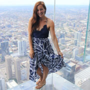 Travel Blogger in a Asymmetrical Floral Maxi Dress