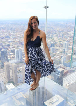 Travel Blogger in a Asymmetrical Floral Maxi Dress