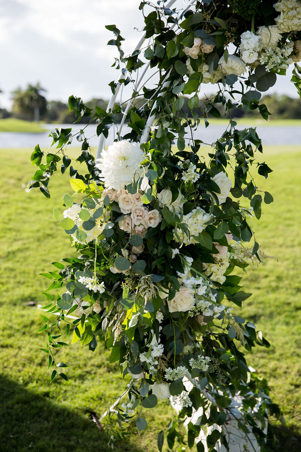 Green and White Wedding Arch