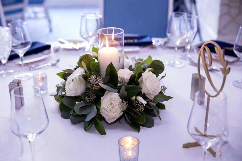 Green and White Wedding Floral Centerpiece with Candle