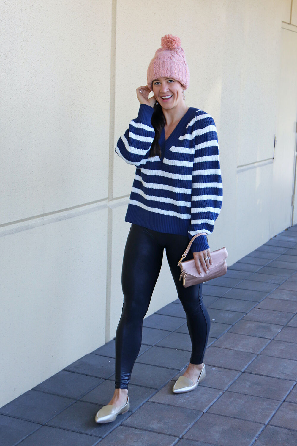 Winter Style in Universal Thread Cable Pom Beanie in Clay and Navy Striped Sweater