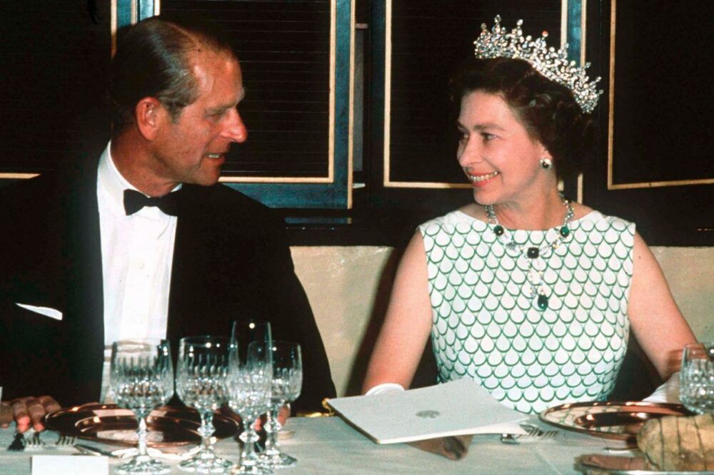 1970 - Queen Elizabeth II wearing a white and green dress with Prince Philip at a State banquet in 1970