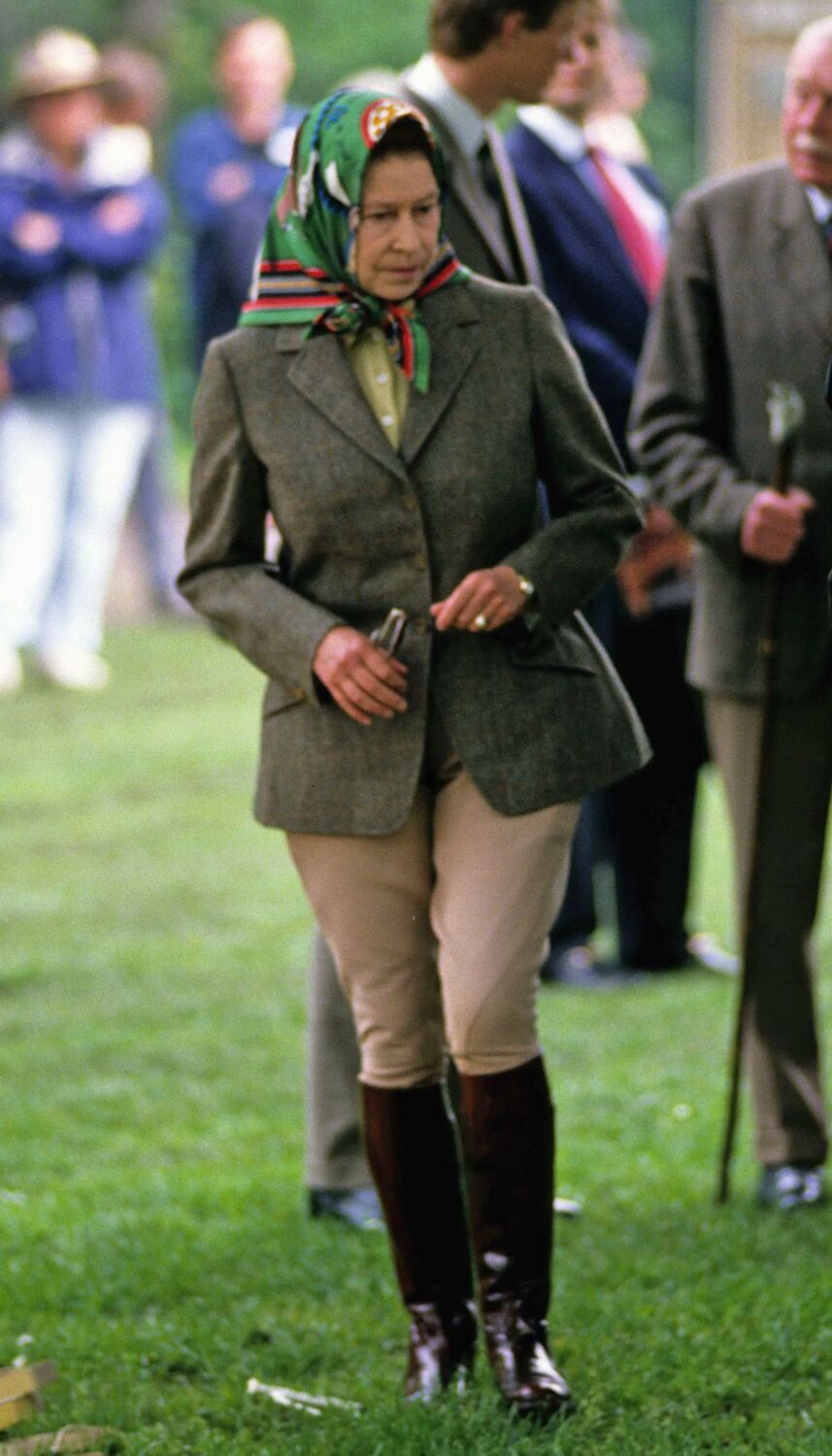 1988 - Her Majesty wearing riding gear and a printed headscarf at the Royal Windsor Horse Show
