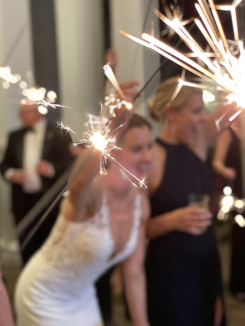 Bride with Wedding Sparklers in Focus