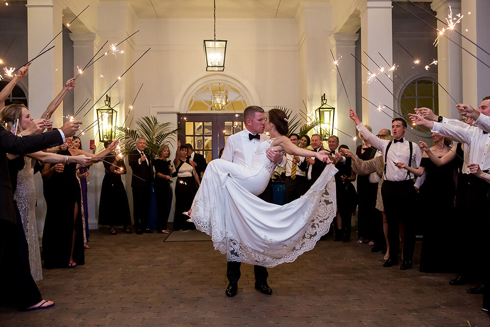 Groom Lifts the Bride