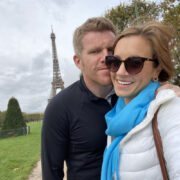 Paris Selfie in a Lightweight White Puffer Jacket and Blue Scarf