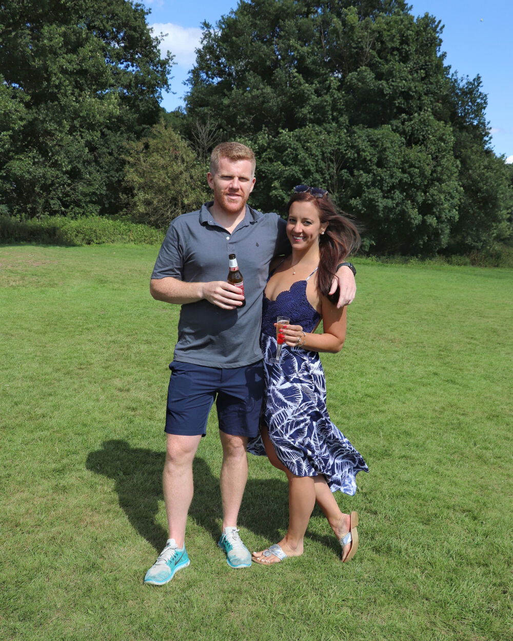 Celebrating our engagement in Derbyshire wearing a Floral High Low Dress and Jack Rogers