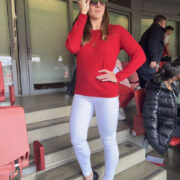 Red and White Outfit for an Arsenal Match at Emirates Stadium
