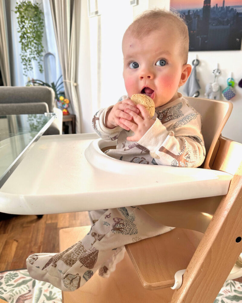Lily Harper Eating in Stokke High Chair - Strawberry Birthmark