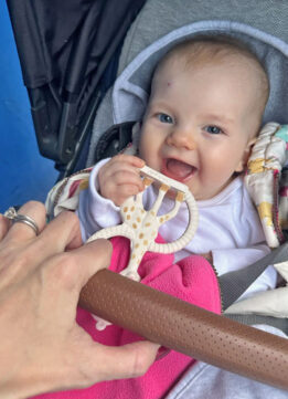 Lily Harper Eating in Uppababy Vista with Sophie - Strawberry Birthmark.jpg